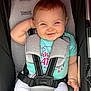 baby, infant, toddler, smiling, red_hair, blue_shirt, car_seat, stroller, seatbelt, harness, buckle, cheeks, teeth, chubby_cheeks, hand, portrait, candid, cute, fabric, safety