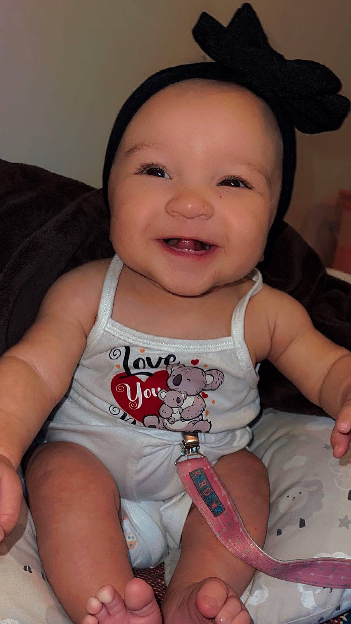 Laylani is registered to the contest to win money with this photo: baby_toddler_clothing, cheek, chin, eye, face, facial_expression, hairstyle, head, human_body, joy, lip, mouth, neck, nose, organ, person, skin, sleeve, smile, standing