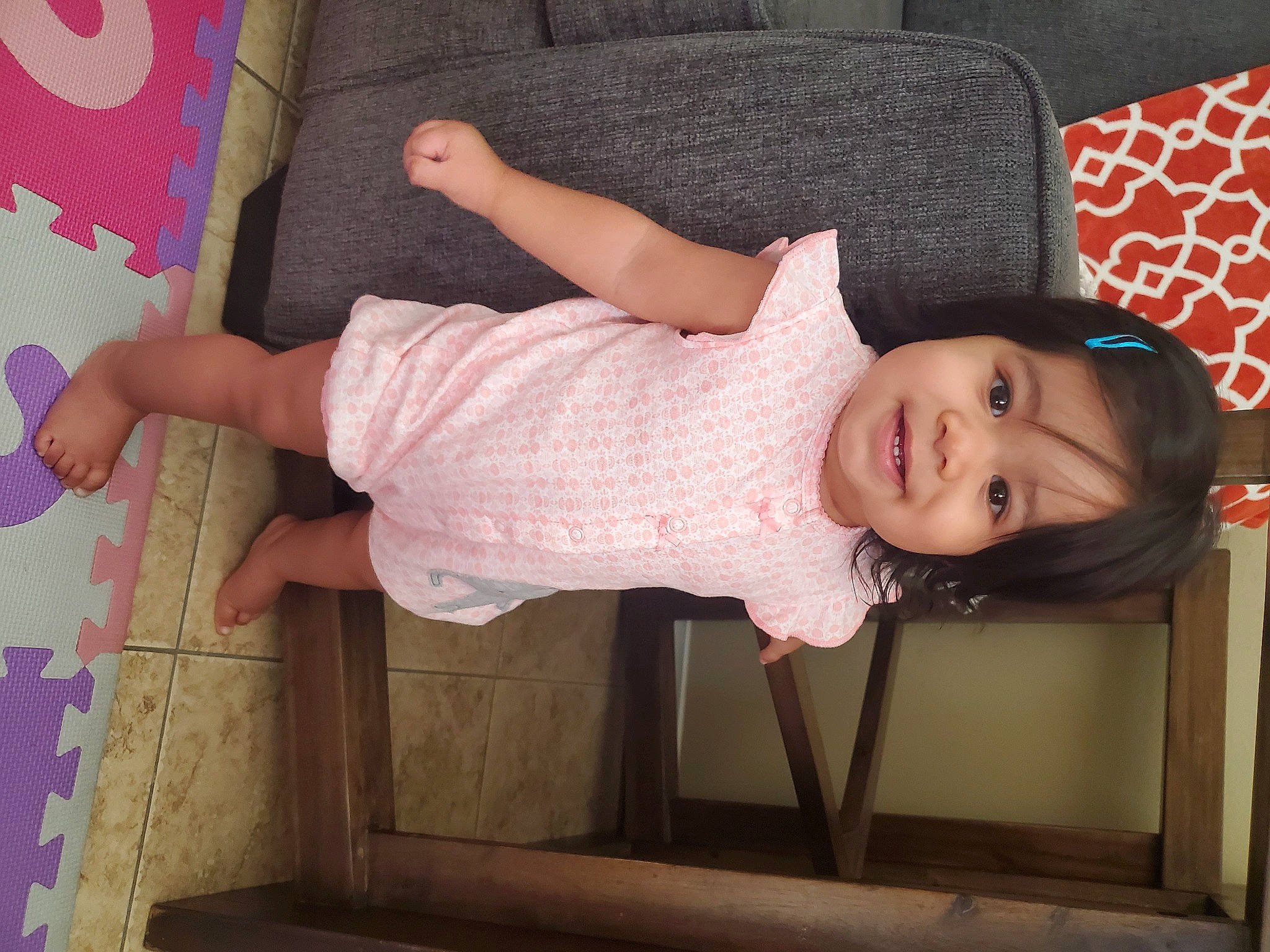 Aila is registered to the contest to win money with this photo: arm, baby, child, furniture, joy, leg, person, photography, pink, toddler