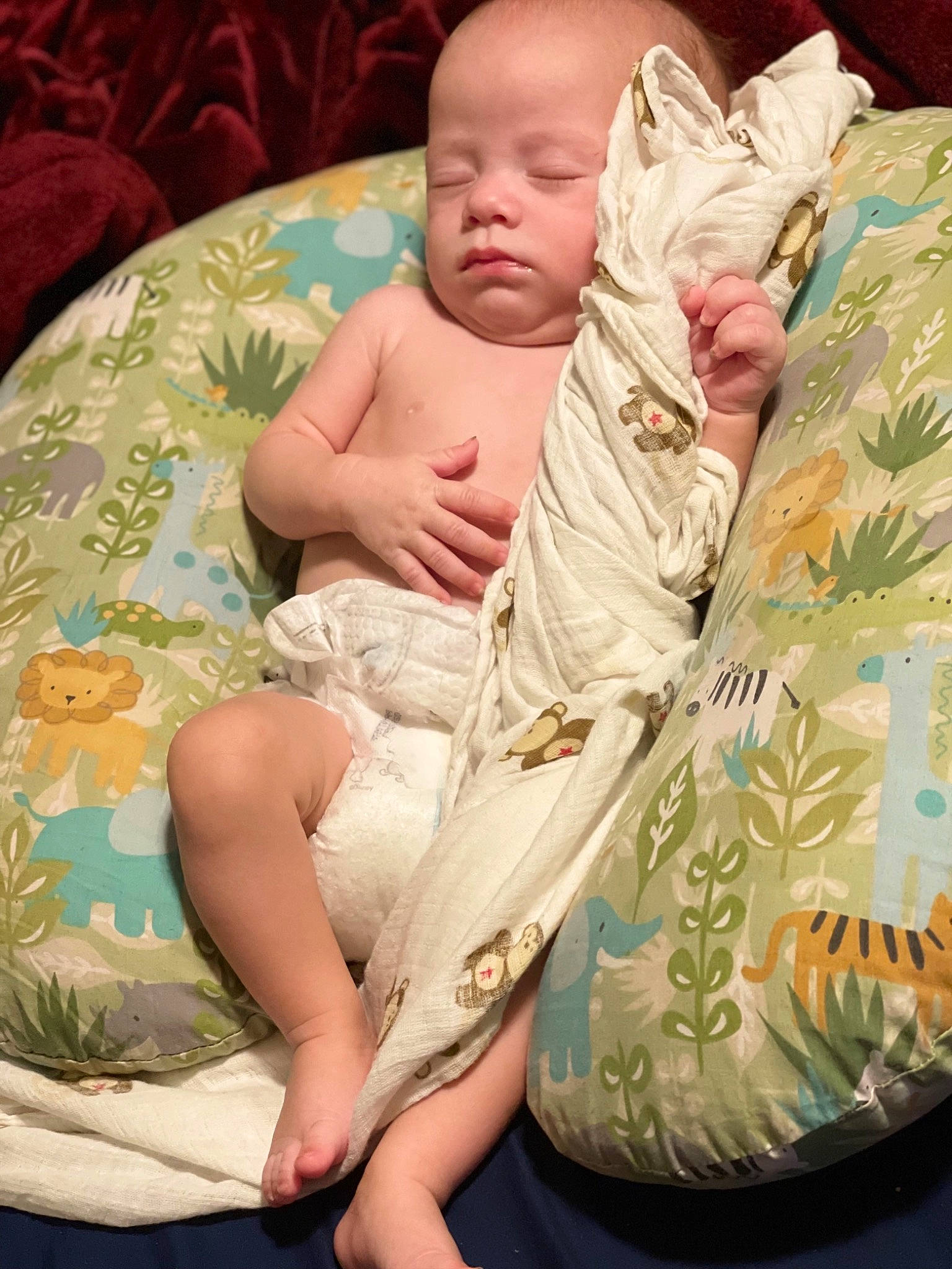 Asher is registered to the contest to win money with this photo: abdomen, baby, baby_sleeping, baby_toddler_clothing, barefoot, cheek, comfort, face, finger, foot, head, human_body, knee, leg, linens, neck, person, skin, sleeve, thigh