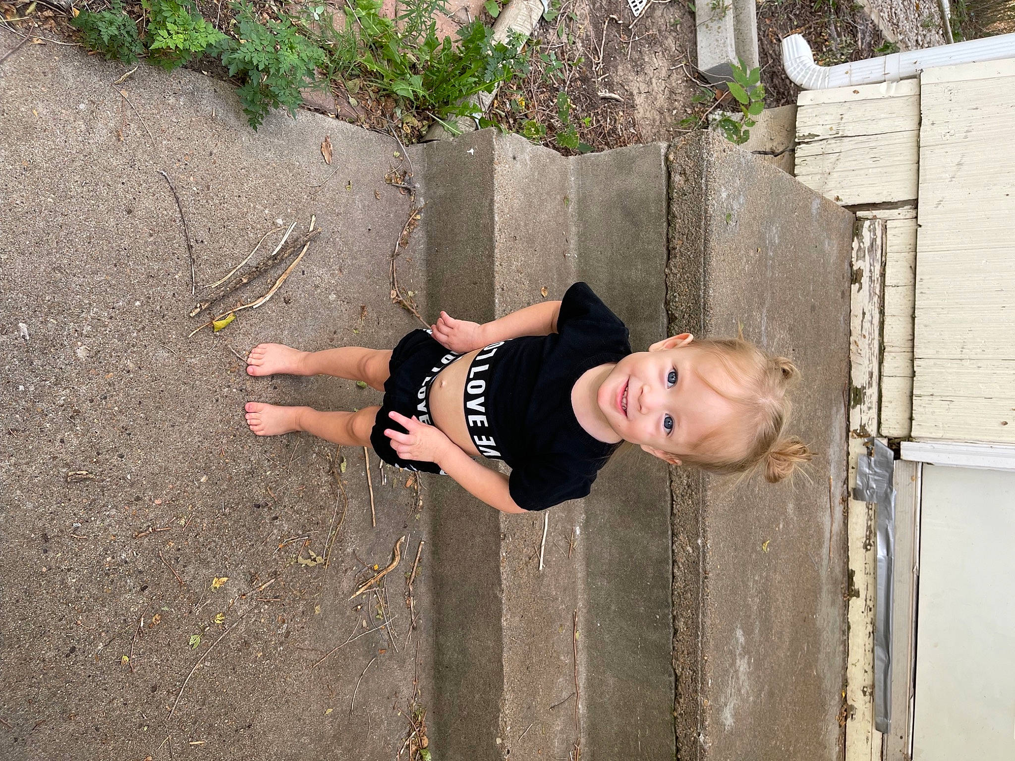 Skye joined the competition — help win amazing prizes! asphalt, concrete, fun, grass, happy, human_leg, joy, leisure, people_in_nature, person, plant, recreation, road_surface, smile, snapshot, soil, street_fashion, t_shirt, thigh, toddler