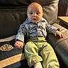 baby, child, infant, sitting, couch, leather, shirt, checkered_shirt, suspenders, pants, green_pants, socks, white_socks, face, eyes, hand, indoor, furniture, portrait, cute