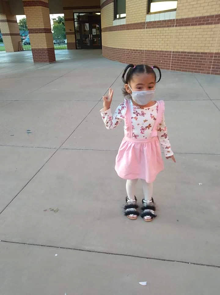 Julissa is registered to the contest to win money with this photo: baby_toddler_clothing, child, child_model, day_dress, floor, person, pink, snapshot, toddler