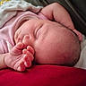 baby, newborn, sleeping, blanket, pink_clothing, hand, face, infant, peaceful, closeup, skin, rest, cute, soft, cozy, portrait, child, tiny, fingers, sleep