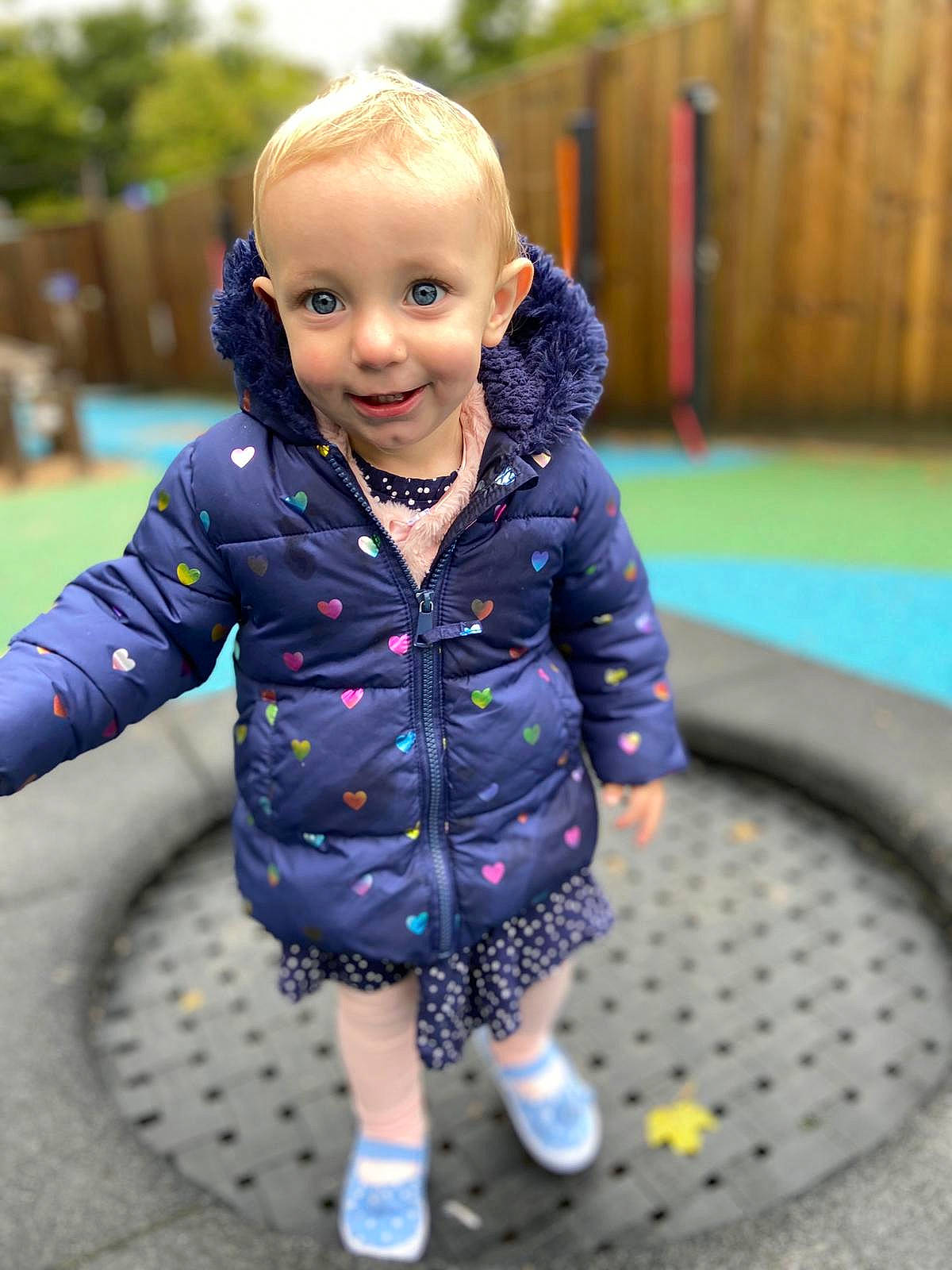 Darcy joined the competition — help win amazing prizes! baby, cheek, child, child_model, iris, jacket, joy, leisure, outdoor_play_equipment, outerwear, pattern, person, plaid, play, playground, public_space, recreation, skin, sleeve, smile