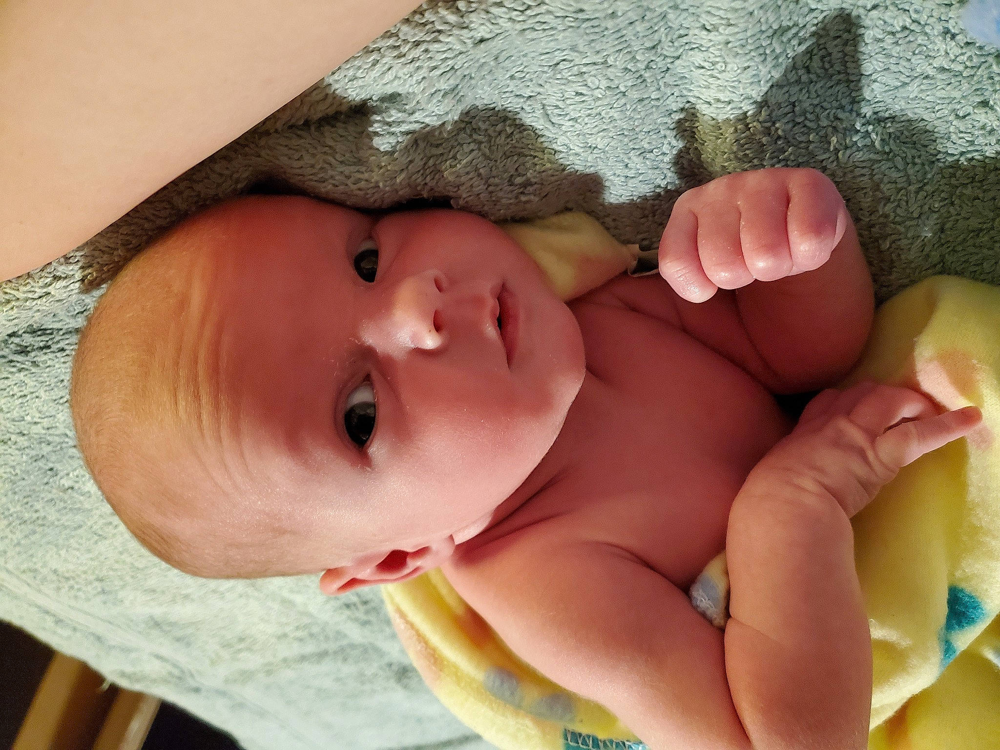 Danny is registered to the contest to win money with this photo: baby, cheek, chest, chin, eye, eyebrow, finger, head, headgear, human_body, lip, mouth, muscle, neck, nose, person, pink, skin, stomach, textile