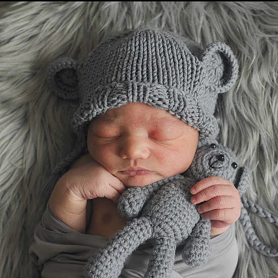 Xavian joined the competition — help win amazing prizes! baby, baby_sleeping, beard, cap, close_up, comfort, eye, fur, grass, grey, head, headgear, knit_cap, linens, mammal, textile, toddler, vertebrate, wool, woolen