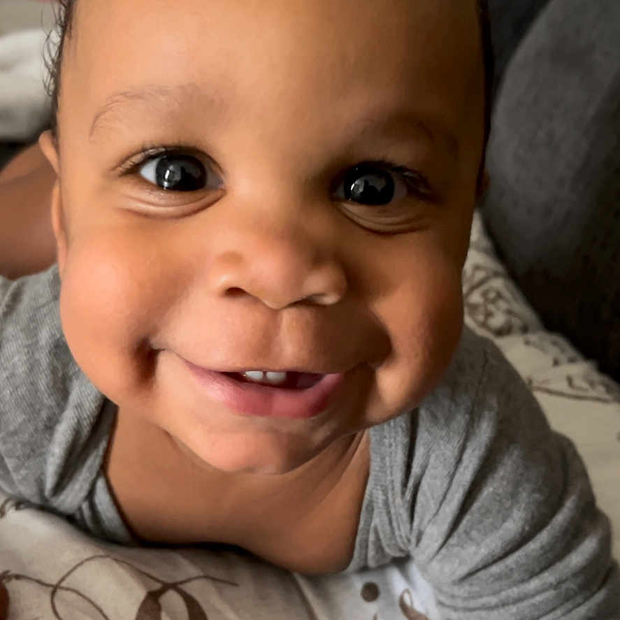 Aire Imyr Rose joined the competition — help win amazing prizes! baby, babylaughing, bodypart, clothing, couch, face, finger, furniture, hand, happy, head, laughing, mouth, newborn, person, photography, portrait, smile, t_shirt, teeth