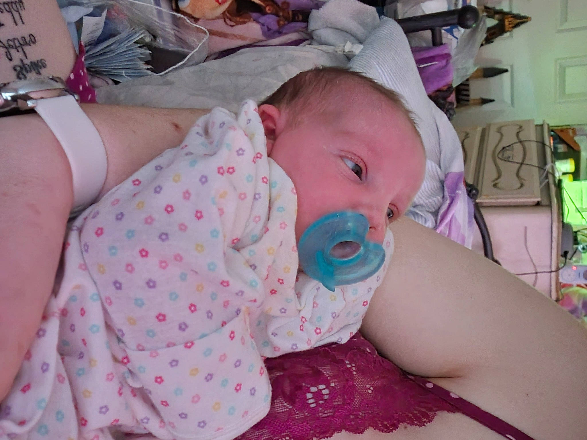 Izzabella is registered to the contest to win money with this photo: baby, baby_products, baby_safety, baby_toddler_clothing, cheek, child, comfort, event, eyewear, fun, hat, linens, mouth, pattern, person, pink, room, sitting, skin, textile