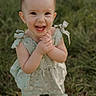 Everleigh is registered to the contest to win money with this photo: child, toddler, smiling, happy, outdoor, grass, greenery, clothing, floral, cute, person, baby, face, portrait, playful, nature, summer, young, feet, shoes