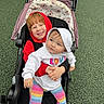 Arabella is registered to the contest to win money with this photo: baby, bonnet, cap, clothing, coat, face, happy, hat, head, hood, hoodie, knitwear, person, photography, portrait, smile, stroller, sweater, sweatshirt, t_shirt