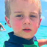 Lorenzo joined the competition — help win amazing prizes! child, boy, face, portrait, beach, ocean, water, swim_shirt, blue_sky, summer, sunlight, outdoor, person, young, closeup, swimming, childhood, holiday, vacation, sunny