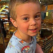 Lorenzo joined the competition — help win amazing prizes! child, boy, smiling, portrait, indoor, short_hair, blond_hair, cartoon_shirt, cute, face, eyes, person, young, childhood, happy, casual_clothing, closeup, curious, skin, innocence