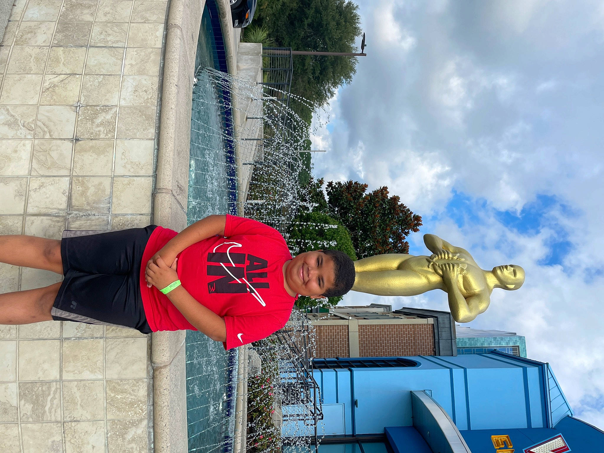 Amari joined the competition — help win amazing prizes! carmine, cloud, elbow, facade, fun, hat, human_leg, joy, leisure, person, pole, recreation, sky, smile, t_shirt, thigh, travel, tree, wrist