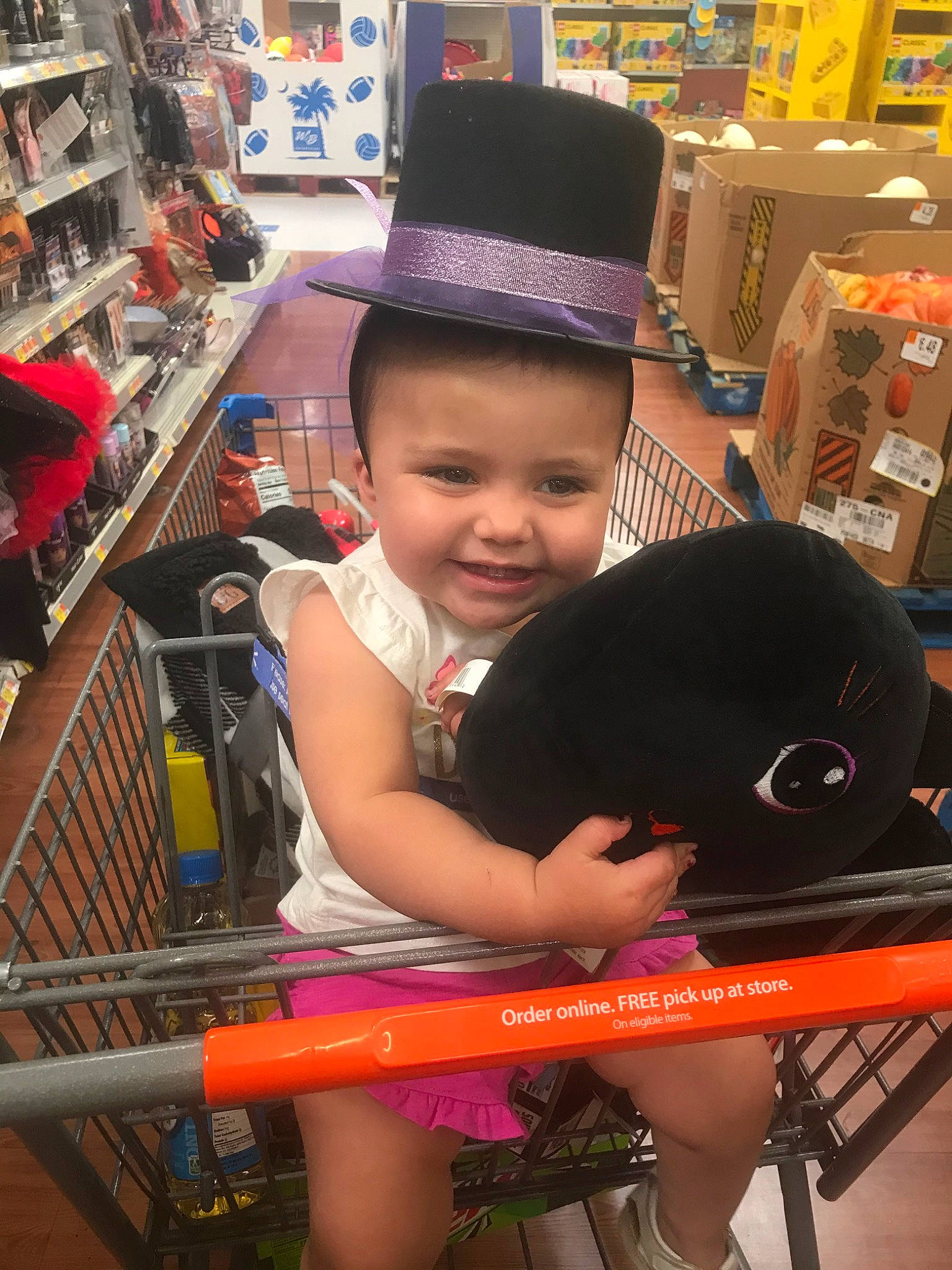 Reyna is registered to the contest to win money with this photo: baby_products, black_hair, cap, child, fashion_accessory, fun, hat, headgear, joy, person, product, toddler, vacation, vehicle