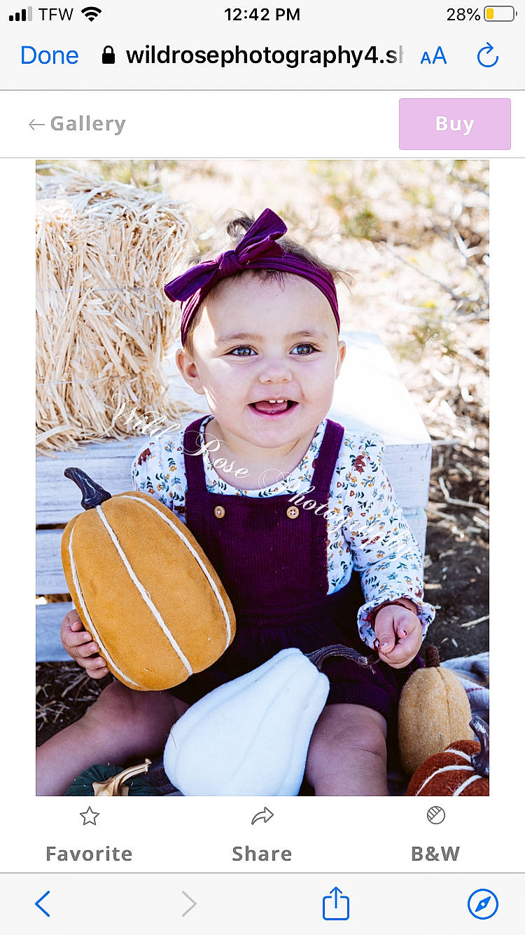 Reyna is registered to the contest to win money with this photo: baby, child, child_model, joy, musical_instrument, pattern, person, photograph, photography, portrait, portrait_photography, sitting, stock_photography, style, toddler