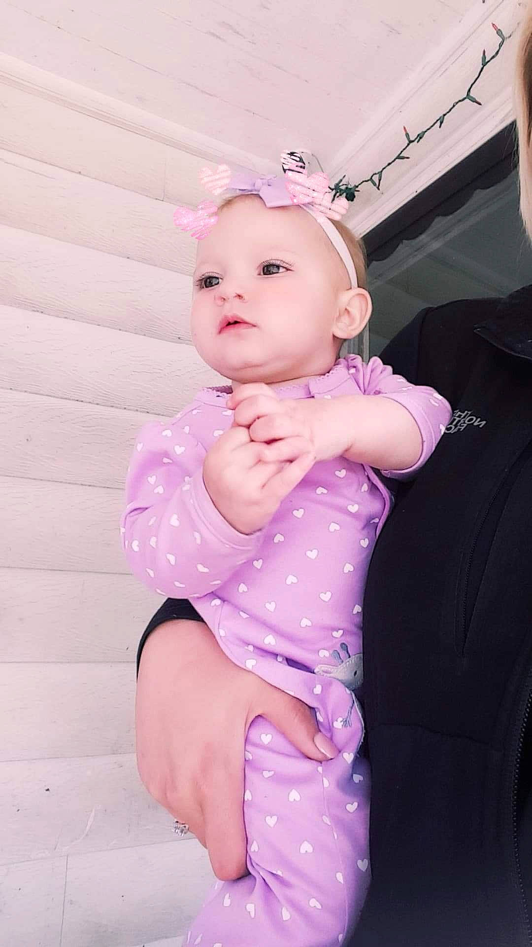 Skylee is registered to the contest to win money with this photo: baby, baby_toddler_clothing, beauty, cheek, child, design, dress, eye, face, head, lip, neck, pattern, person, photography, pink, polka_dot, purple, skin, smile
