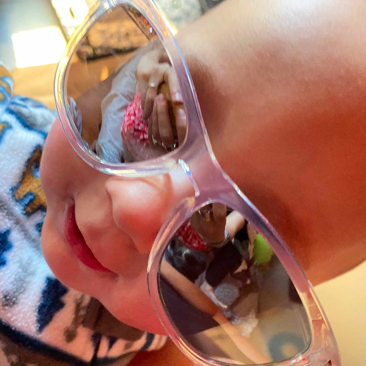 Keelan joined the competition — help win amazing prizes! automotive_lighting, aviator_sunglass, comfort_food, drinking, eye_glass_accessory, eyewear, fashion_accessory, fluid, foot, fun, glass, glasses, goggles, liquid_bubble, nail, personal_protective_equipment, reflection, sunglasses, transparent_material, vision_care