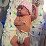 newborn, baby, infant, diaper, pink_hat, blanket, pacifier, hospital_band, lying_down, cute, small, soft_lighting, patterned_blanket, baby_bed, human, child, sleepwear, skin, hand, foot