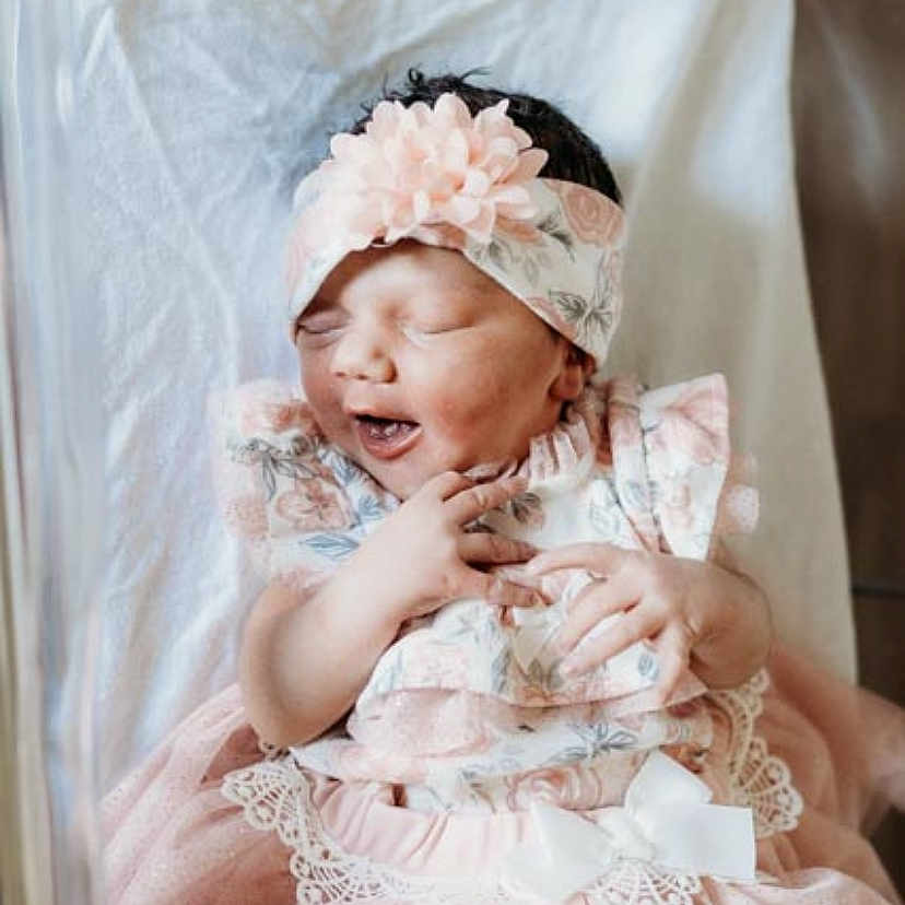 Annsley joined the competition — help win amazing prizes! bridal_accessory, bridal_clothing, child, dress, embellishment, flash_photography, gown, hairstyle, happy, head, headband, headgear, headpiece, iris, petal, pink, skin, textile, toddler, veil