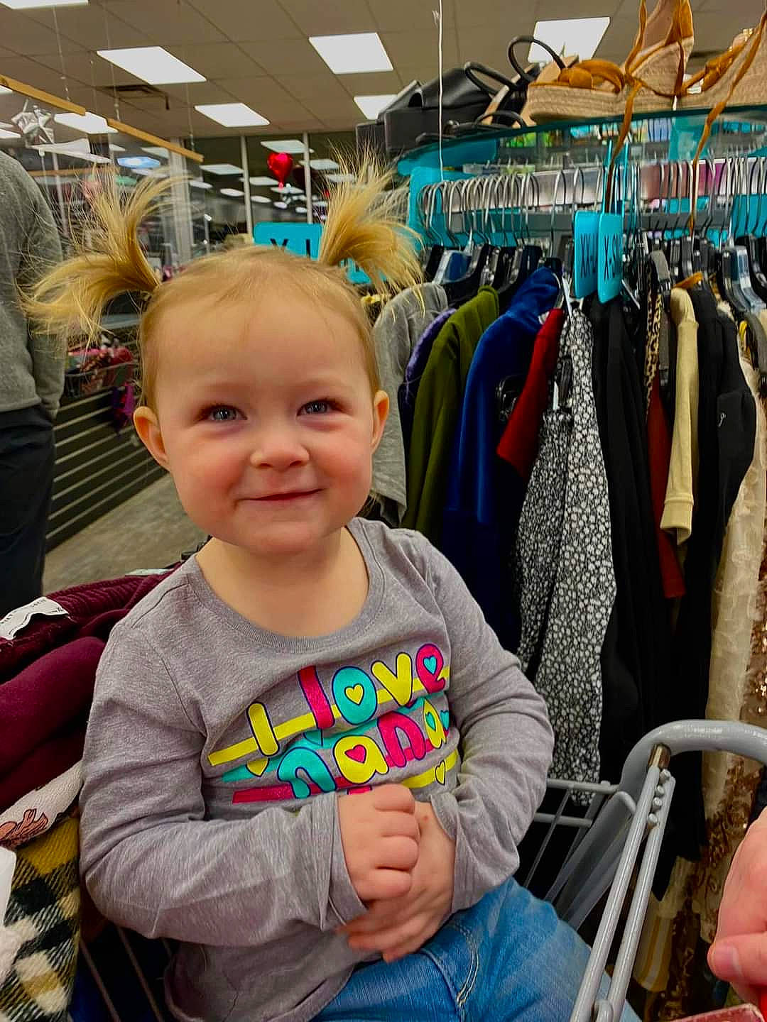 Rosealyn joined the competition — help win amazing prizes! baby, baby_toddler_clothing, child, closet, clothes_hanger, clothing, customer, fun, joy, market, people, person, photograph, product, retail, shelf, shopping, smile, snapshot, t_shirt