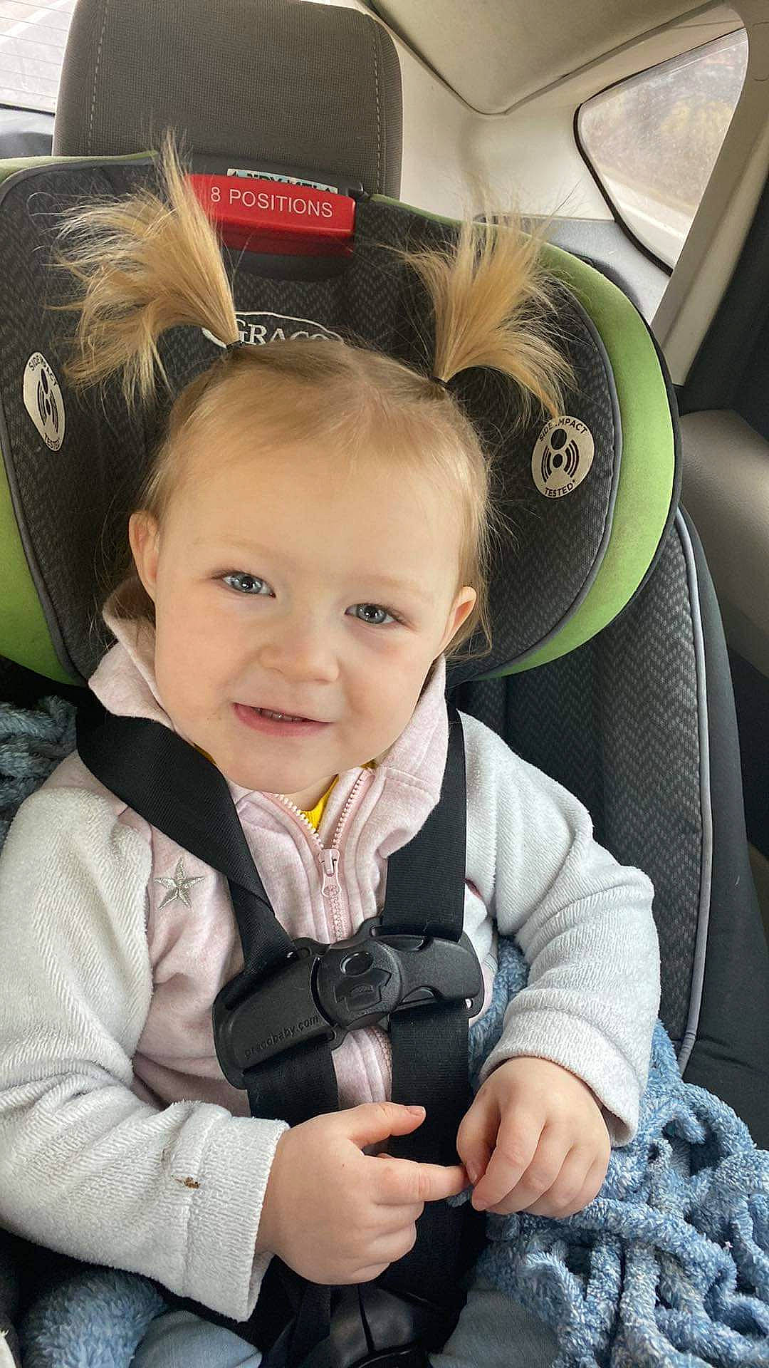 Rosealyn is registered to the contest to win money with this photo: baby, baby_carriage, baby_toddler_clothing, cheek, child, comfort, cool, eye, eyebrow, face, gadget, happy, iris, mammal, outerwear, person, product, seat_belt, sleeve, smile