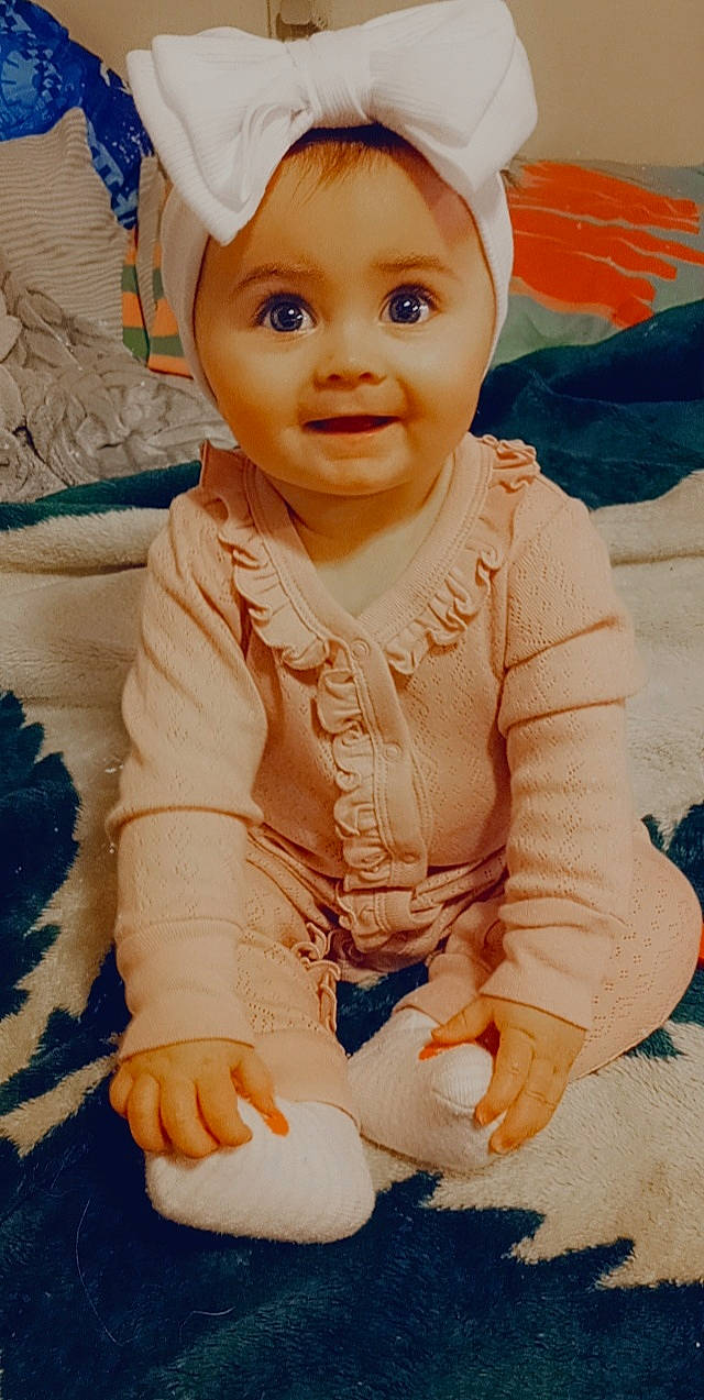 Chevelle joined the competition — help win amazing prizes! baby, baby_toddler_clothing, blue, cheek, child, chin, dress, face, flooring, fun, happy, nose, person, photograph, pink, skin, sleeve, smile, textile, tummy_time