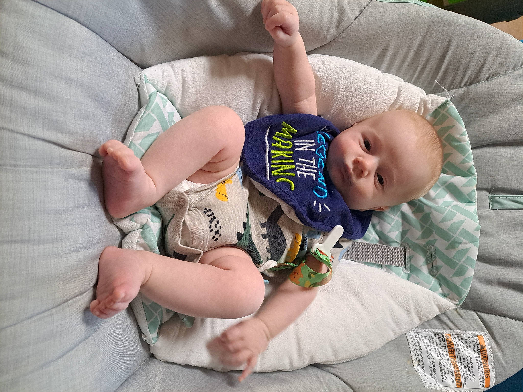 Isaac is registered to the contest to win money with this photo: baby, baby_products, baby_sleeping, baby_toddler_clothing, child, comfort, couch, eye, finger, foot, grass, hand, human_body, knee, linens, person, sitting, skin, textile, thigh