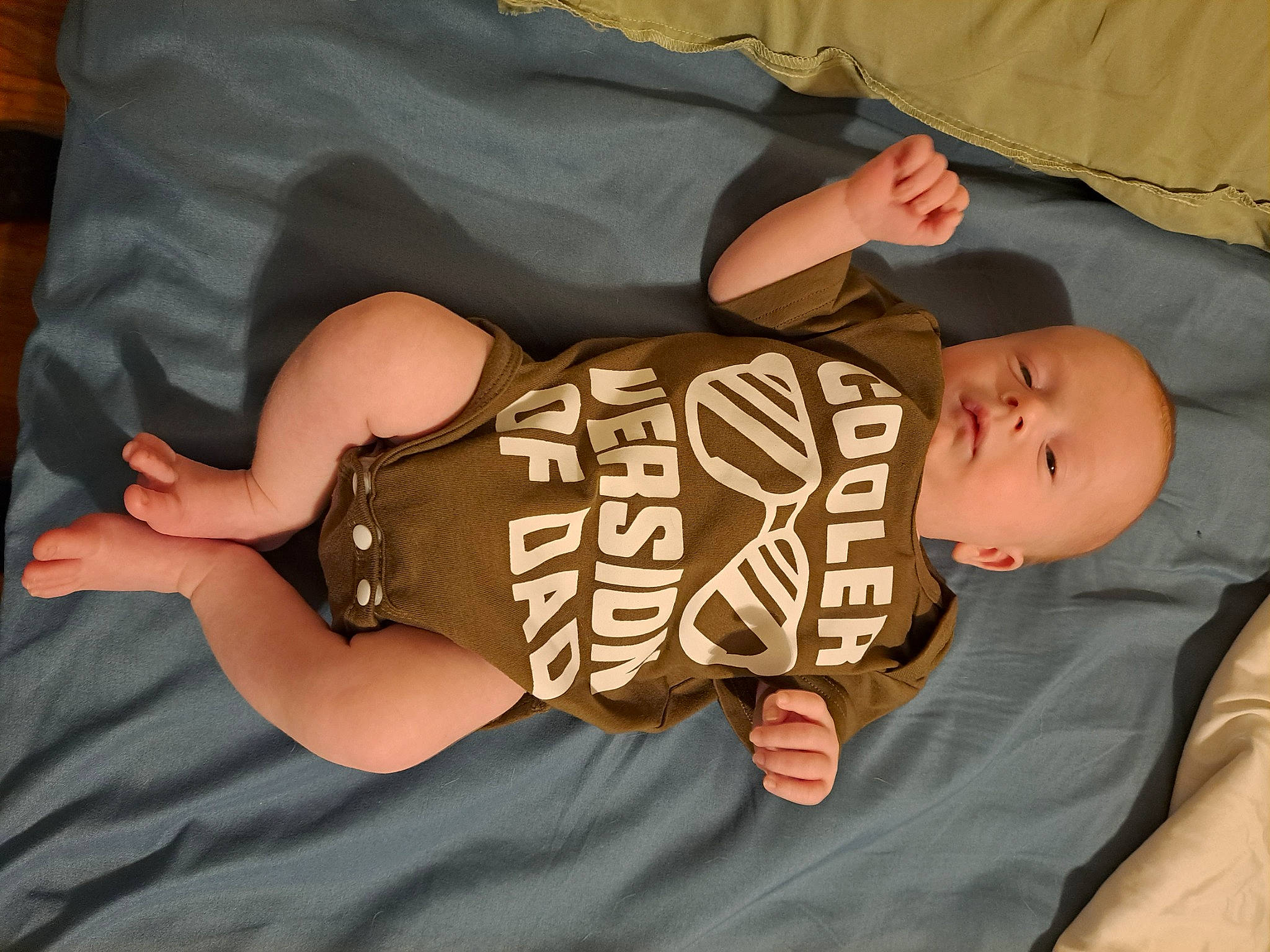 Isaac joined the competition — help win amazing prizes! baby_toddler_clothing, child, comfort, elbow, finger, gesture, hand, hat, headgear, human_body, human_leg, nail, person, sleeve, t_shirt, thigh, thumb, toddler, trunk, wood