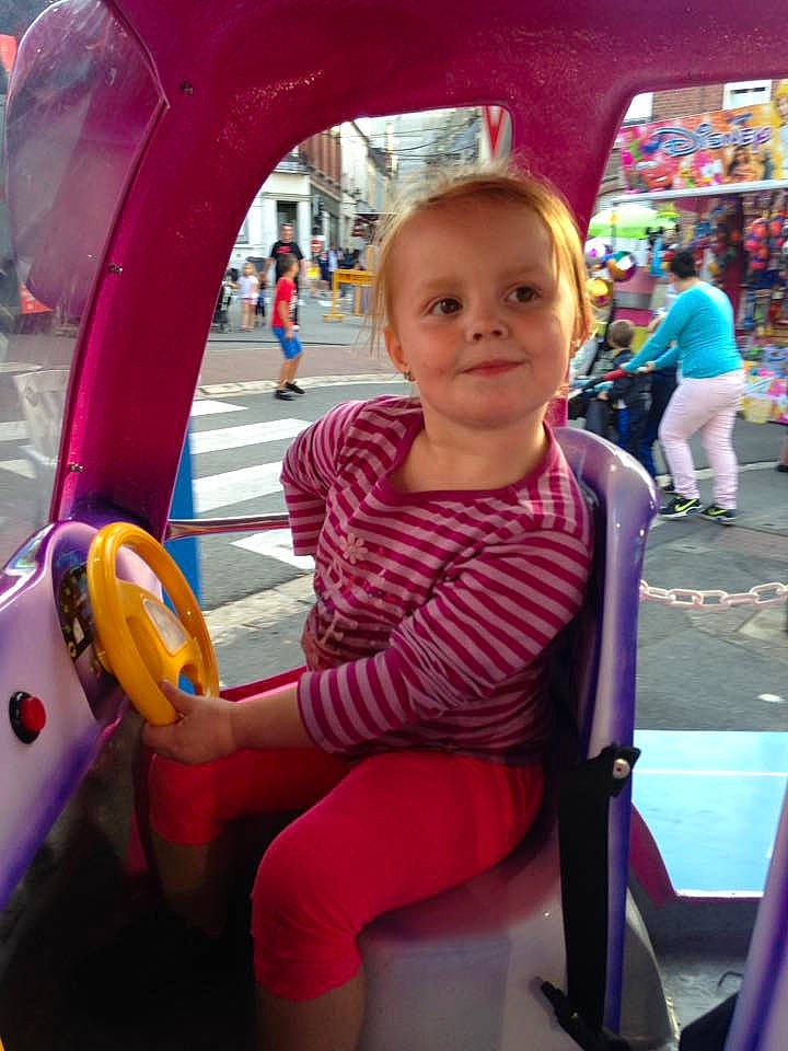 Cassidy participe au concours pour gagner de l'argent avec cette photo : amusement_park, city, fun, human_settlement, joy, lap, leg, leisure, magenta, outdoor_play_equipment, park, person, pink, play, playground, public_space, purple, recreation, shoe, snapshot