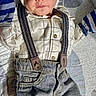 newborn, baby, sleeping, hat, mittens, suspenders, jeans, striped_clothing, blanket, pattern, soft_light, indoor, cute, infant, clothing, face, peaceful, portrait, resting, baby_clothes