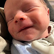 Kohen joined the competition — help win amazing prizes! baby, newborn, close_up, sleeping, smile, face, infant, soft, cozy, skin, head, clothing, peaceful, cute, child, portrait, indoors, young, resting, newborn_baby