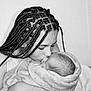Timéo a rejoint le concours — aidez-le/la à gagner de superbes lots ! child, baby, braids, black_and_white, hugging, kissing, tenderness, love, family, portrait, indoor, blanket, swaddled, close_up, affection, cute, person, young, infant, gentle