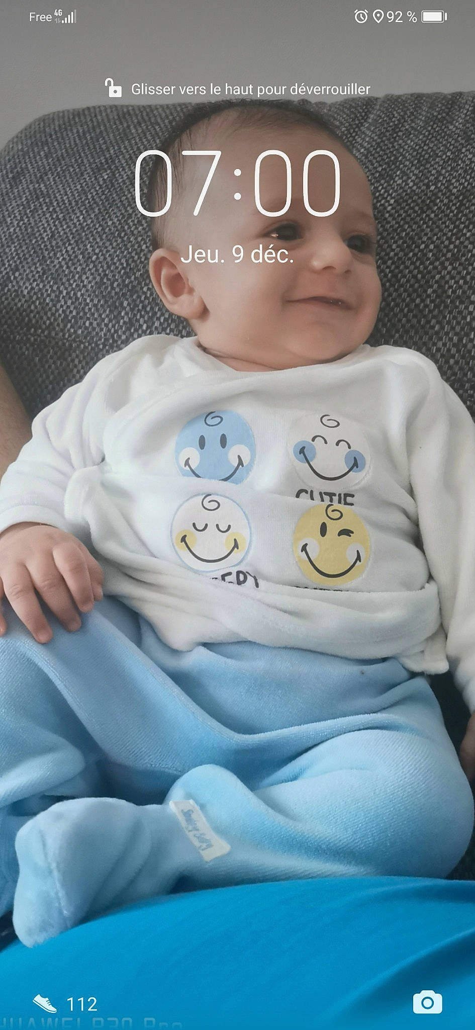 Can participe au concours pour gagner de l'argent avec cette photo : baby, baby_products, baby_safety, baby_toddler_clothing, cheek, child, chin, comfort, facial_expression, font, happy, linens, nose, person, product, sitting, skin, sleeve, smile, t_shirt