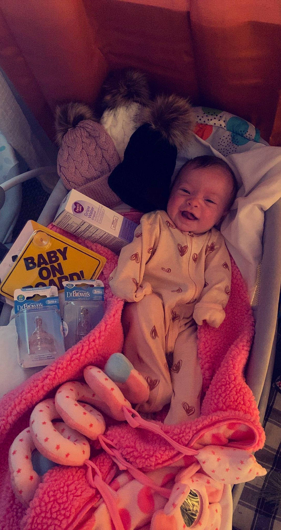 Ava Mae is registered to the contest to win money with this photo: baby, baby_sleeping, bologna_sausage, child, chorizo, comfort, cuisine, dish, happy, ingredient, kielbasa, lap, natural_foods, peach, person, pink, product, smile, toddler, toy