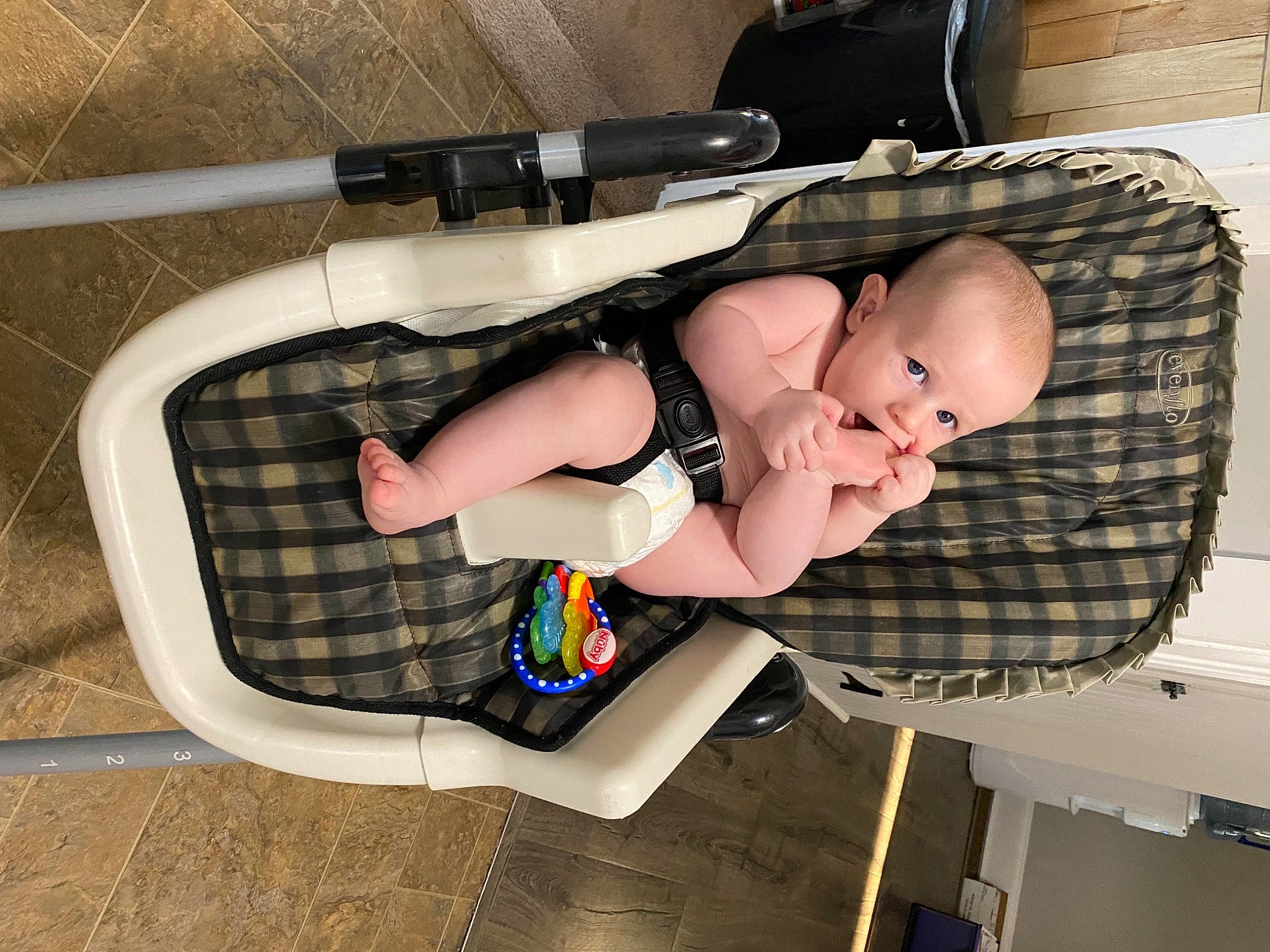 Emmett joined the competition — help win amazing prizes! abdomen, baby, baby_carriage, baby_products, baby_safety, baby_toddler_clothing, child, comfort, finger, foot, human_leg, knee, leg, pattern, person, personal_protective_equipment, sandal, sitting, sock, thigh