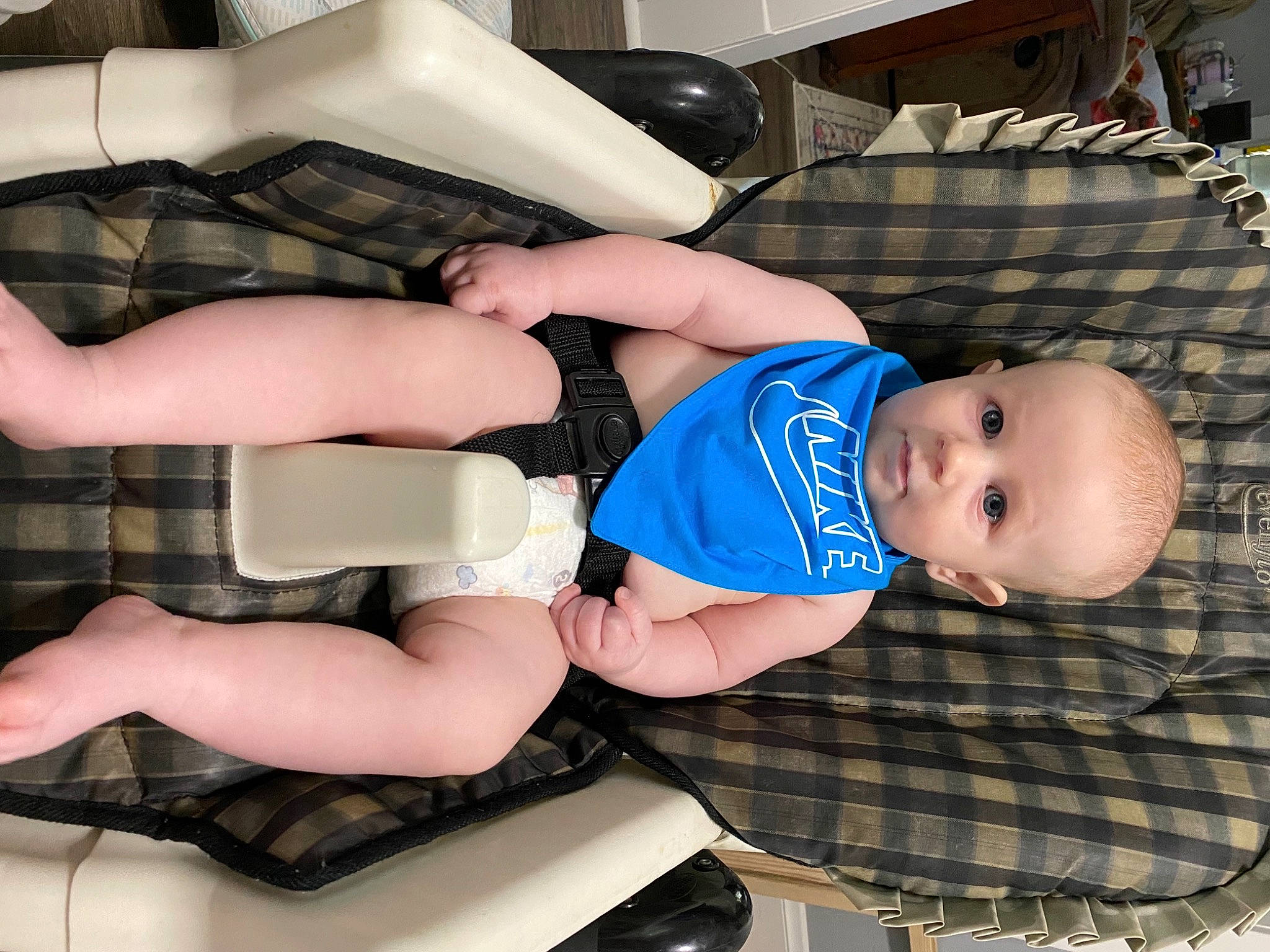 Emmett joined the competition — help win amazing prizes! arm, baby, baby_toddler_clothing, comfort, elbow, finger, hairstyle, hand, human_body, joint, knee, lap, leg, mammal, person, shoe, shorts, sneakers, sock, thigh