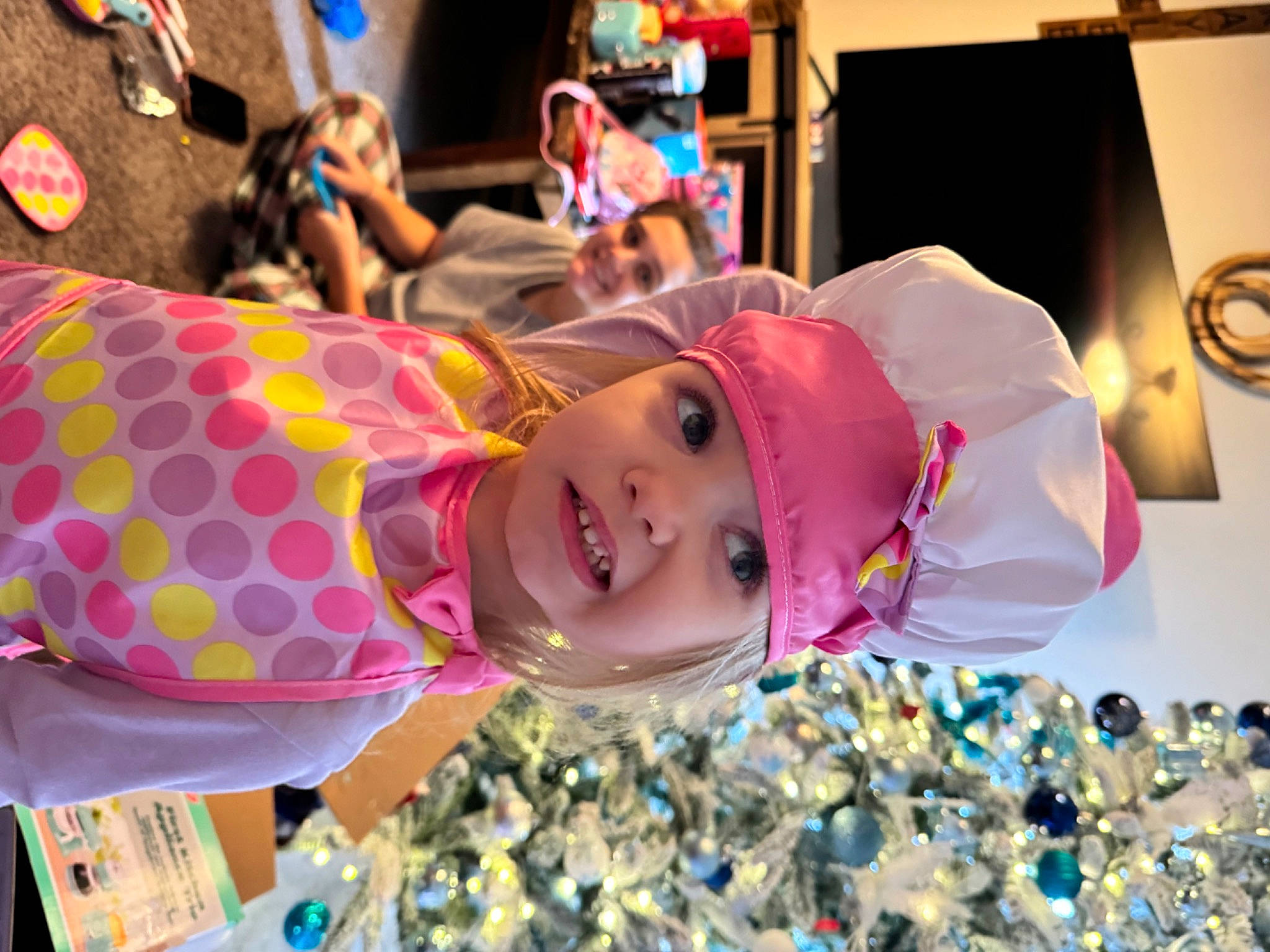 Kaylee is registered to the contest to win money with this photo: child, entertainment, event, fashion_accessory, festival, fun, happy, hat, headwear, joy, leisure, magenta, party, pattern, person, pink, public_event, purple, recreation, smile
