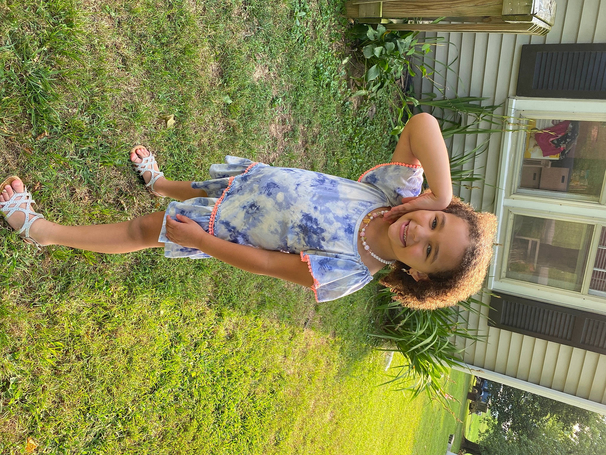 Zaryiah is registered to the contest to win money with this photo: electric_blue, fun, garden, grass, grassland, happy, human_leg, joy, lawn, leisure, people_in_nature, person, plant, recreation, shorts, shrub, smile, t_shirt, thigh, tree