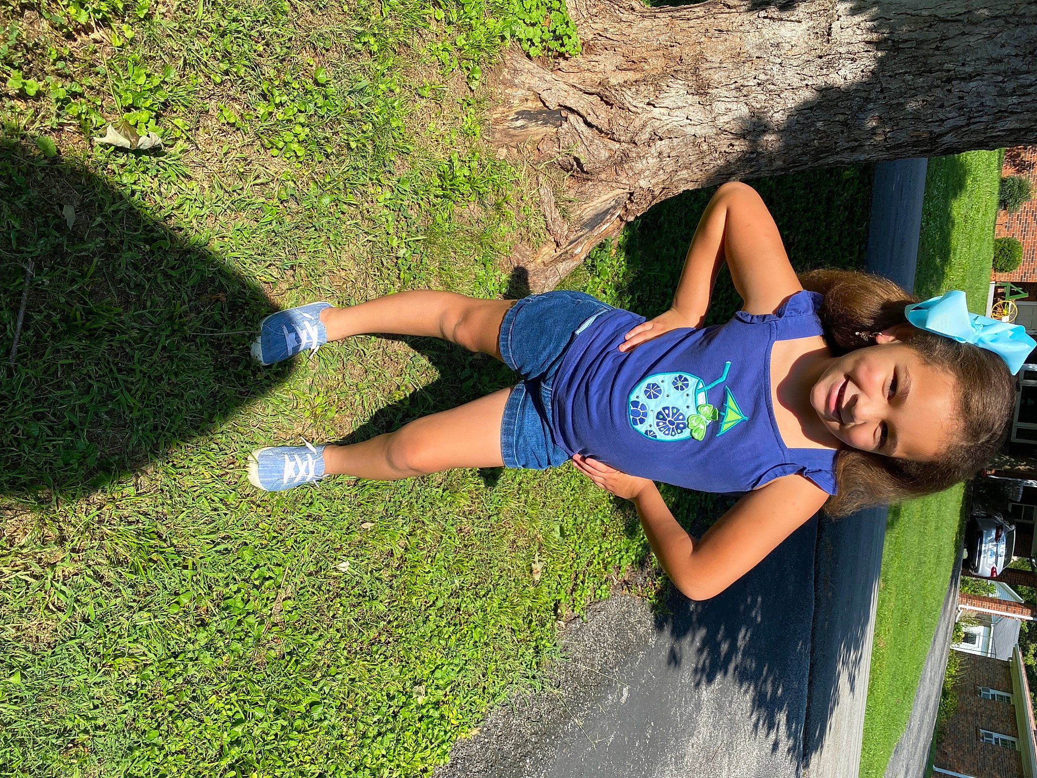 Zaryiah is registered to the contest to win money with this photo: electric_blue, fun, grass, happy, human_leg, joint, joy, knee, leisure, people_in_nature, person, plant, recreation, shadow, shorts, smile, sportswear, street_fashion, t_shirt, thigh