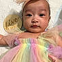 baby, infant, tulle_dress, headband, bow, pastel_colors, rainbow, milestone, five_months, wooden_sign, quilted_blanket, portrait, face, eyes, cute, child, laying_down, soft_fabric, newborn, adorable