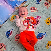 Calix is registered to the contest to win money with this photo: applique, architecture, baby, bed, bedroom, blanket, bodypart, building, clothing, costume, couch, crib, cushion, diaper, dress, face, finger, furniture, glove, hand