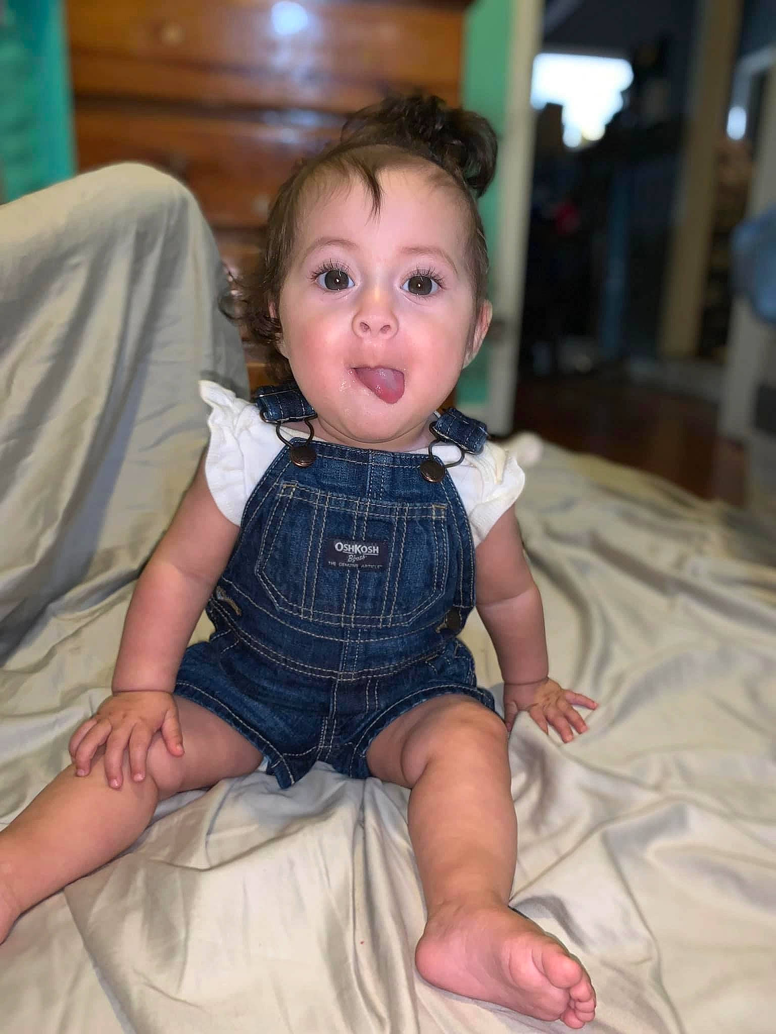 Leilani joined the competition — help win amazing prizes! abdomen, baby_toddler_clothing, cheek, child, comfort, dress, facial_expression, fun, hairstyle, happy, head, iris, joint, person, sitting, skin, sleeve, smile, surprise, thigh