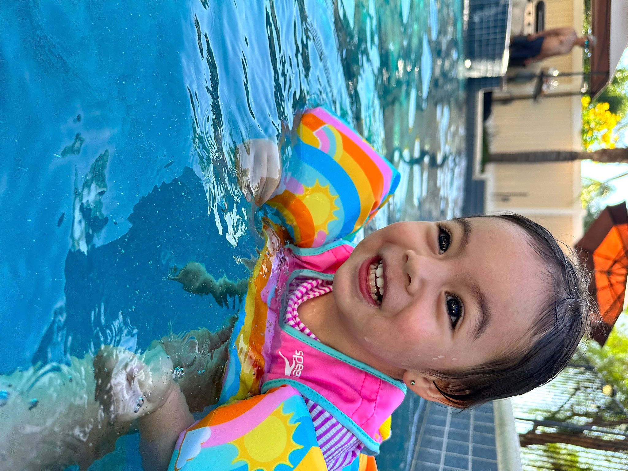 Liliana joined the competition — help win amazing prizes! baby, bathing, child, fun, happy, leisure, person, personal_protective_equipment, plant, play, recreation, smile, summer, swimming_pool, swimwear, toddler, tree, vacation, visual_arts, water