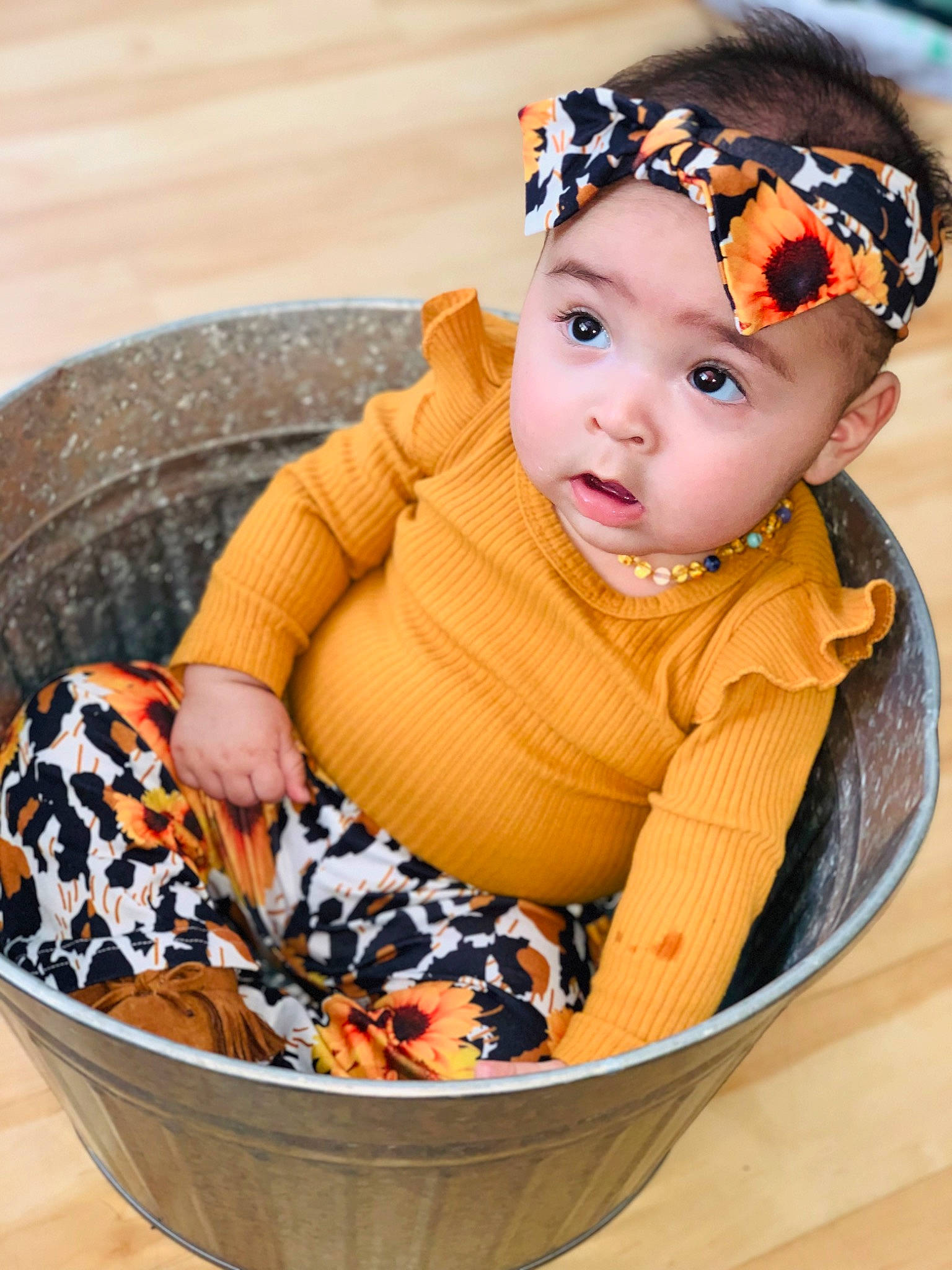 Alicianna is registered to the contest to win money with this photo: baby, baby_products, baby_toddler_clothing, beanie, cap, child, circle, eyelash, face, fashion_accessory, happy, head, headband, headpiece, headwear, jewellery, pattern, person, portrait_photography, sitting