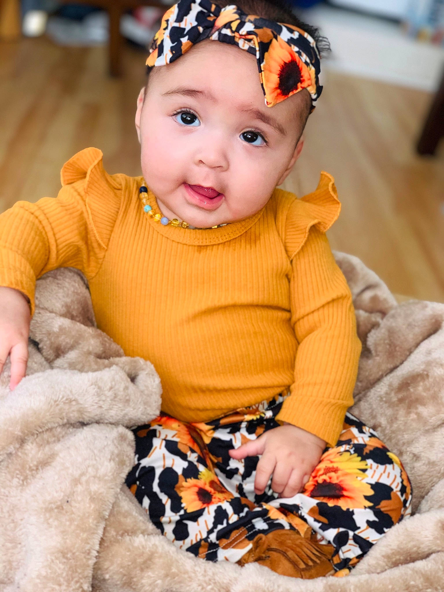 Alicianna joined the competition — help win amazing prizes! baby, baby_toddler_clothing, child, dress, eye, face, happy, head, headgear, headwear, iris, jewellery, orange, outerwear, person, skin, sleeve, textile, toddler, white