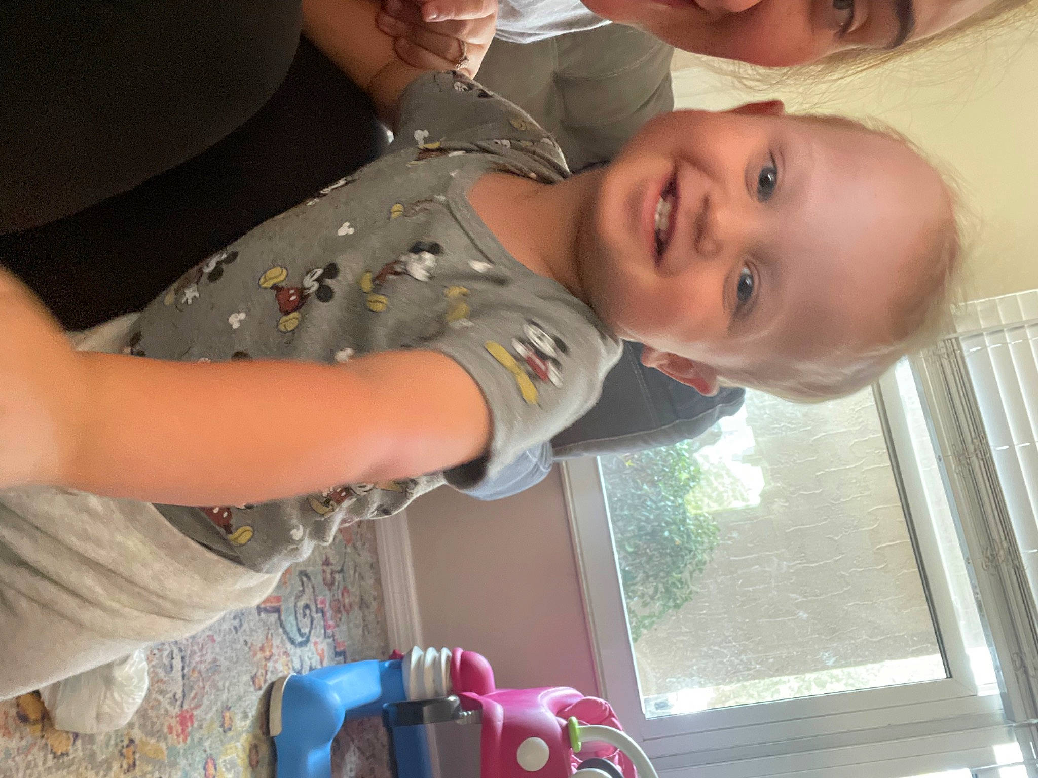 Hank is registered to the contest to win money with this photo: arm, baby, baby_products, baby_toddler_clothing, child, event, fun, gesture, happy, hat, human_body, joy, mouth, nose, organ, person, skin, smile, snapshot, toddler