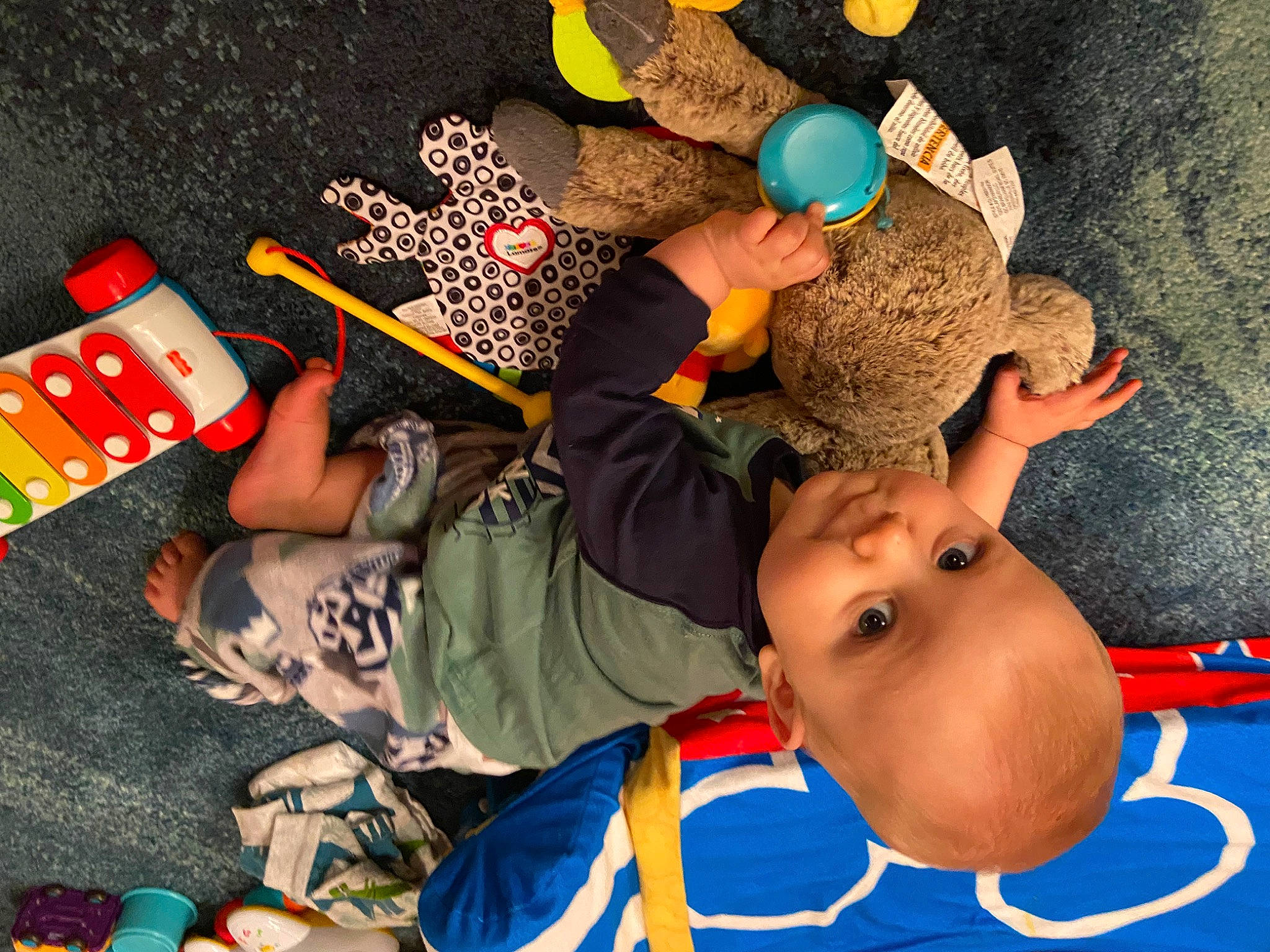 Greyson joined the competition — help win amazing prizes! art, baby, baby_toddler_clothing, baby_toys, child, finger, fun, gesture, hand, happy, leisure, nail, paint, person, play, room, sharing, t_shirt, toddler, toy