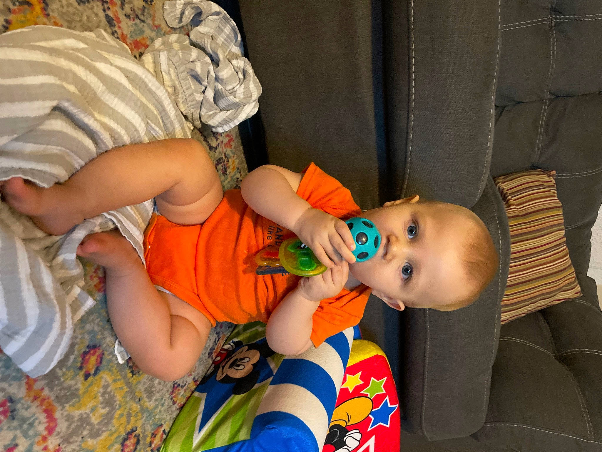 Greyson joined the competition — help win amazing prizes! baby, baby_products, baby_toddler_clothing, cheek, child, comfort, dress, finger, fun, happy, hat, human_body, joint, leg, mouth, orange, person, skin, thigh, toddler