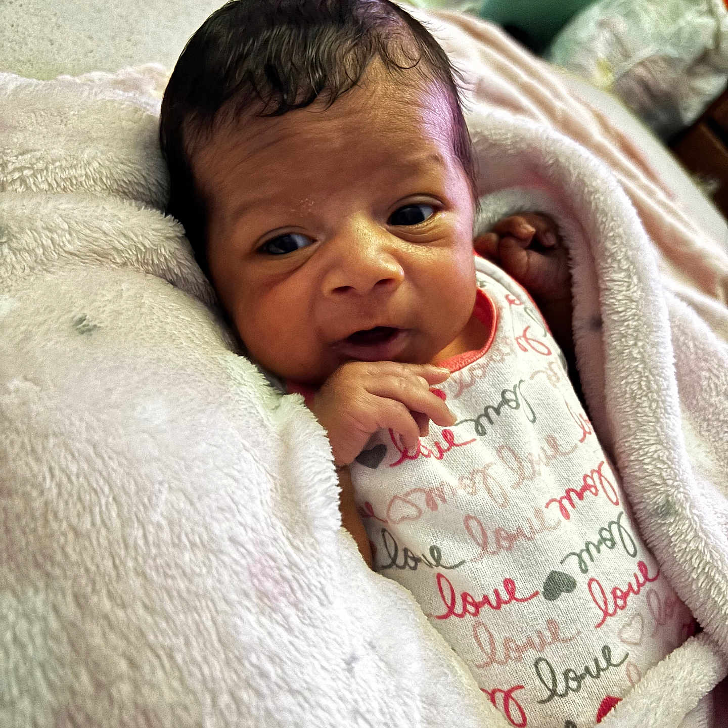 Kinslei joined the competition — help win amazing prizes! baby, blanket, clothing, cozy, cute, expression, face, hand, head, indoors, infant, love_text, newborn, person, portrait, skin, sleepwear, soft, wrapped, young